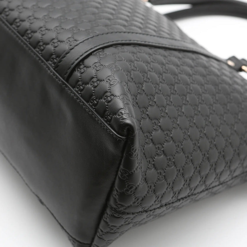 Borsa a mano Gucci mini shopper pelle Guccissima nera