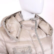 Piumino Moncler beige lungo Hirma con cappuccio