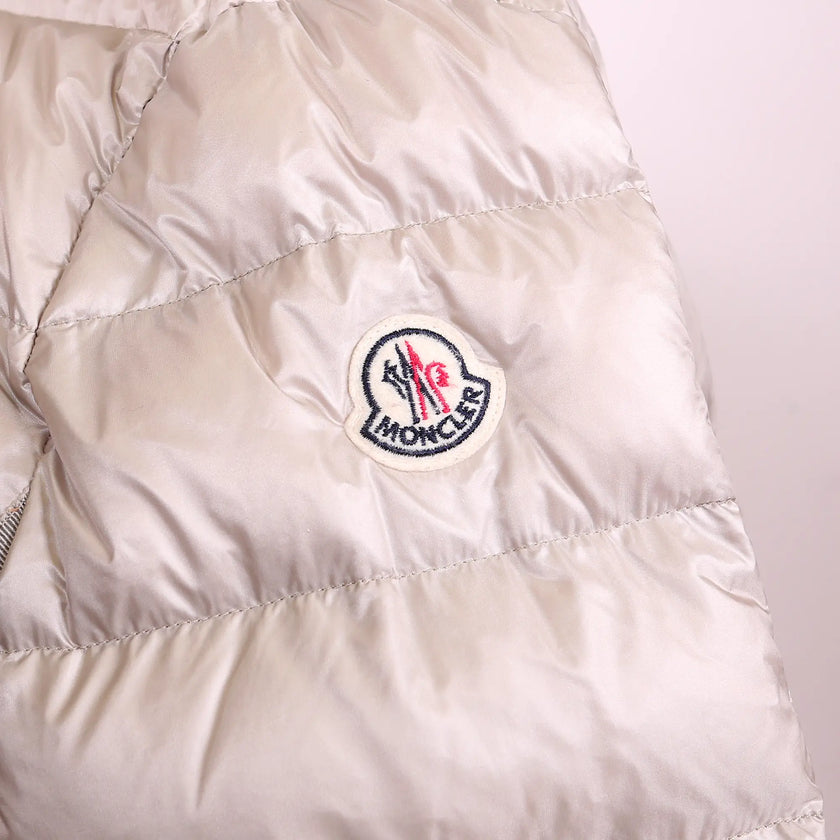 Piumino Moncler beige lungo Hirma con cappuccio