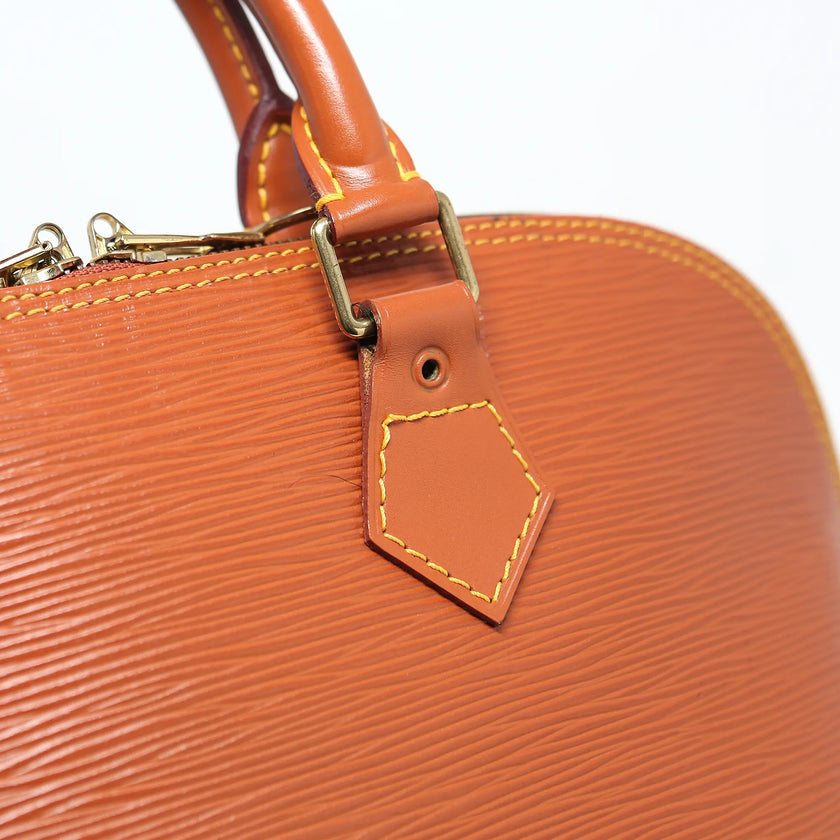 Borsa a mano Louis Vuitton Alma pelle EPI cognac