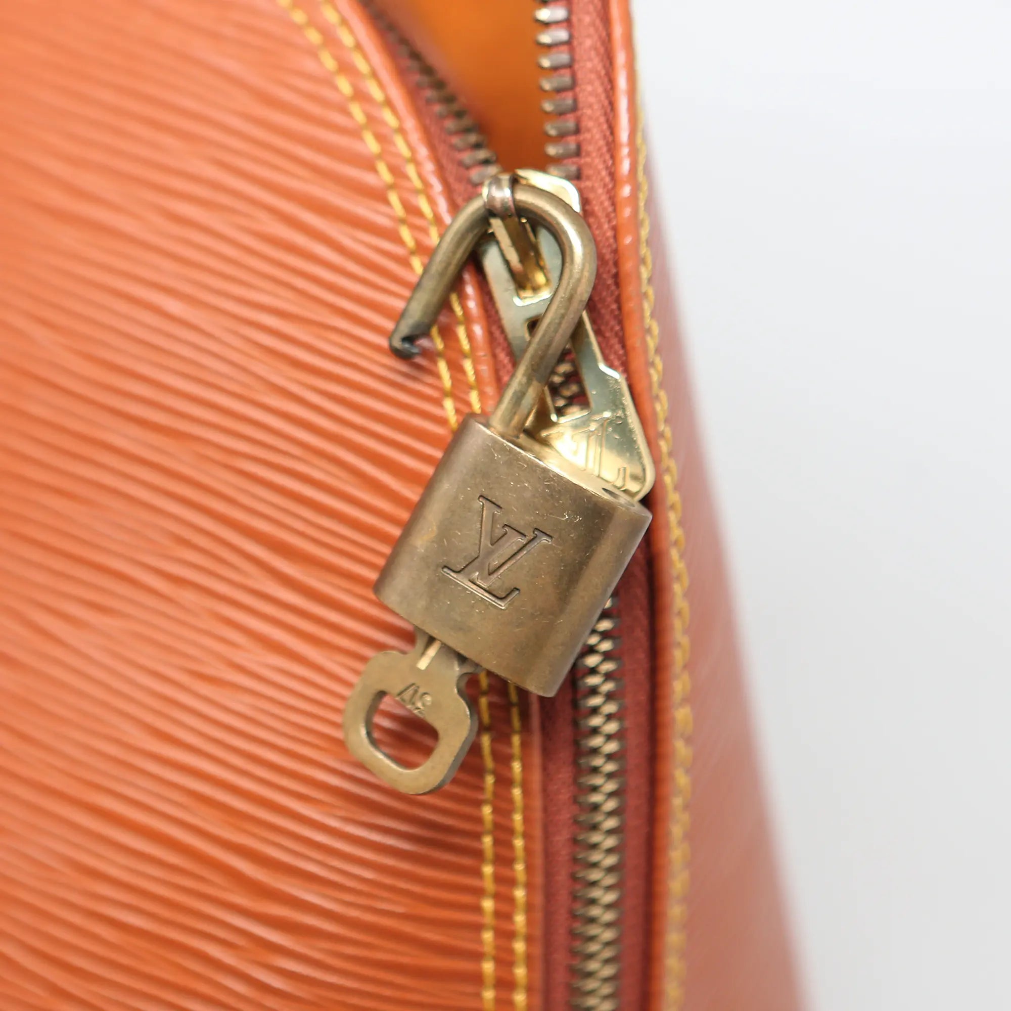 Borsa a mano Louis Vuitton Alma pelle EPI cognac