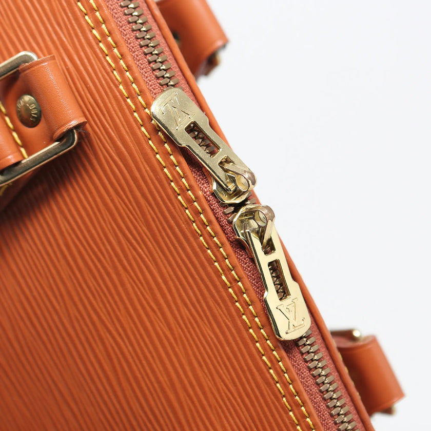 Borsa a mano Louis Vuitton Alma pelle EPI cognac