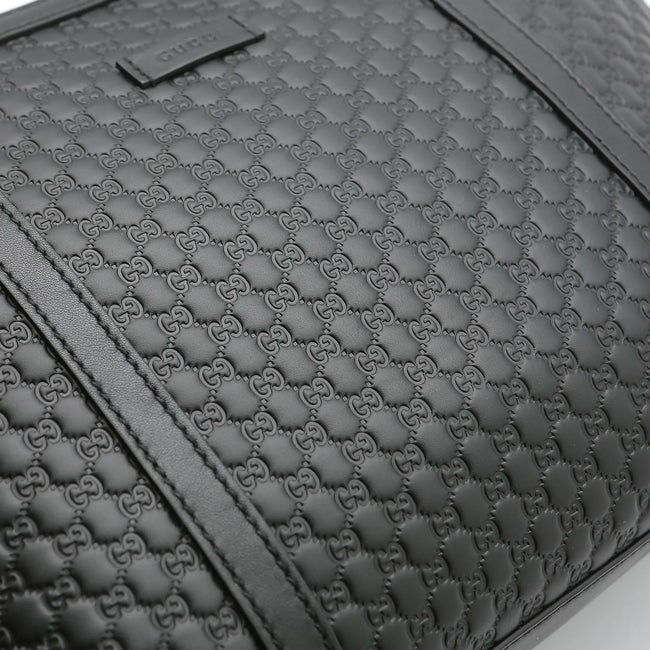 Borsa a mano Gucci mini shopper pelle Guccissima nera