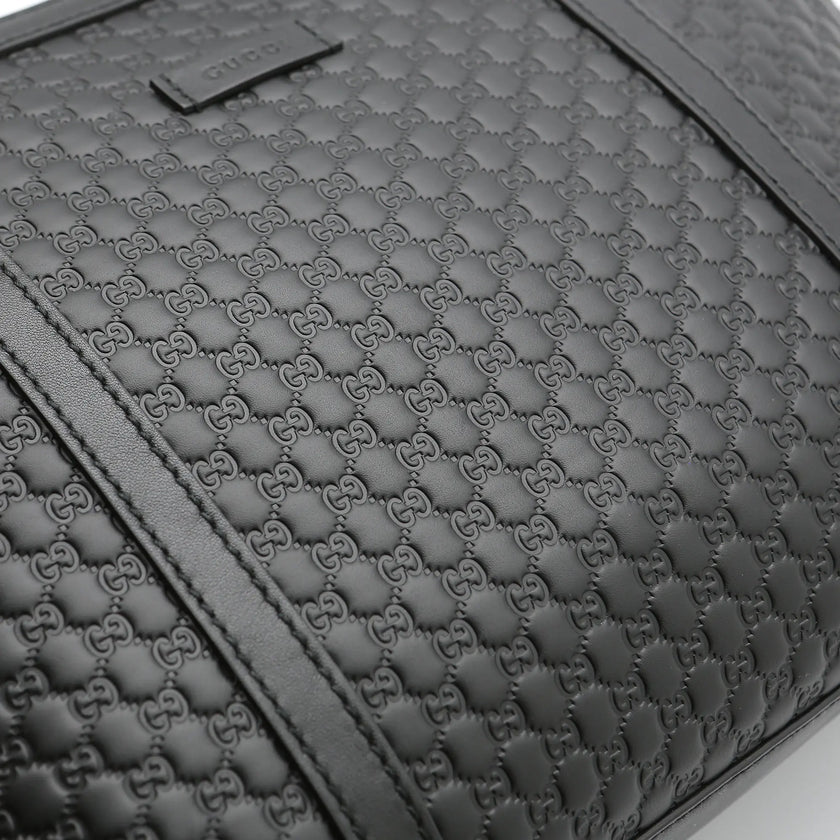 Borsa a mano Gucci mini shopper pelle Guccissima nera