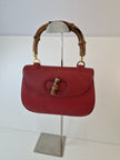 Gucci Handtasche aus rotem Leder „Bamboo 1947“
