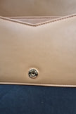 Borsa a spalla Prada in nappa trapuntata color caramello con cuciture 1BD333