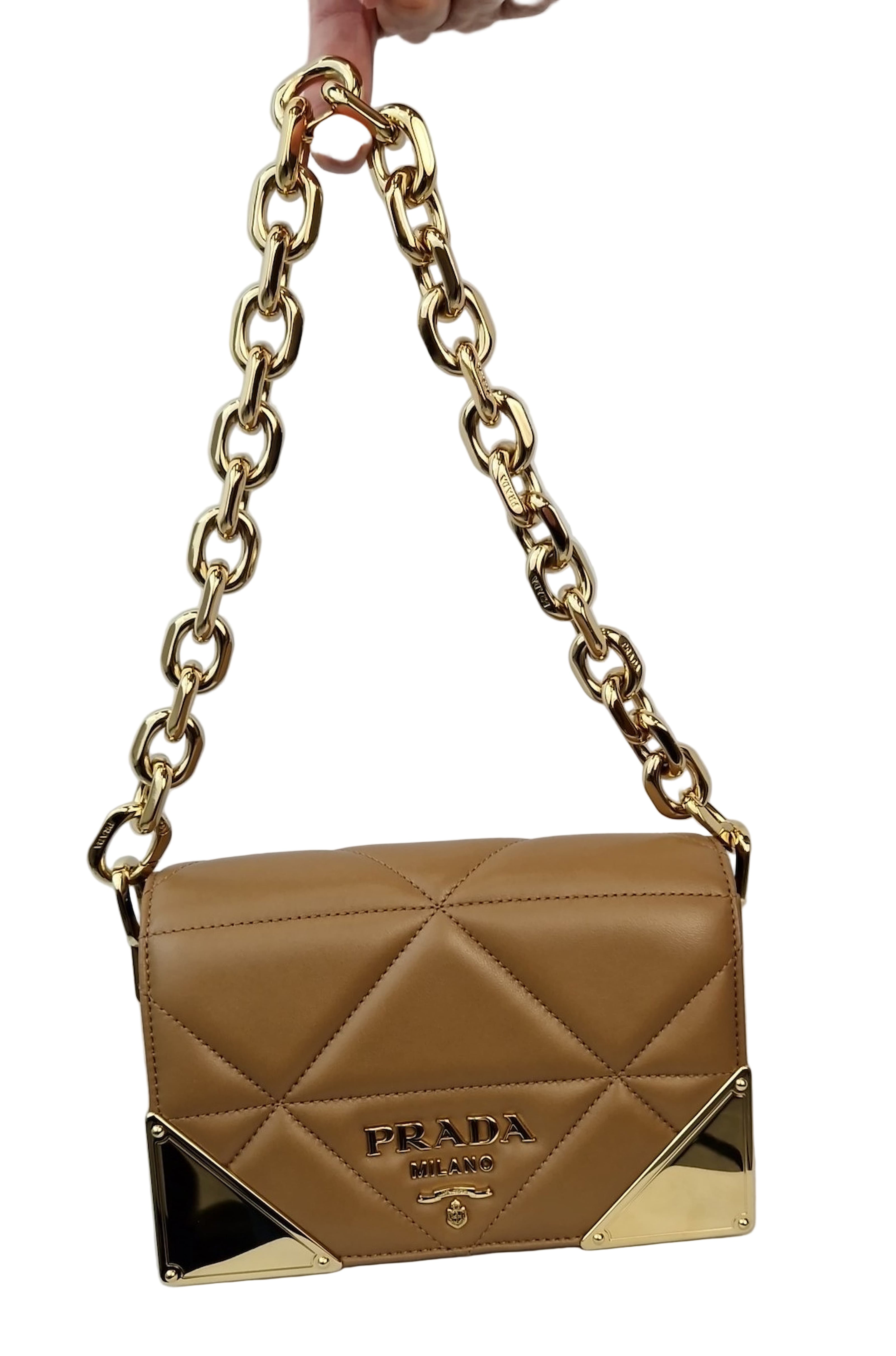 Borsa a mano Prada color beige e bordi oro