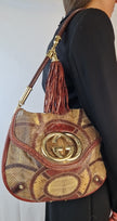 Borsa a spalla Gucci Britt Tassel Hobo Bag pelle pitone