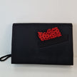 schwarze Satin-Clutch von Christian Dior