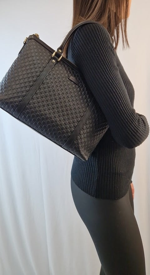 Borsa a mano Gucci mini shopper pelle Guccissima nera